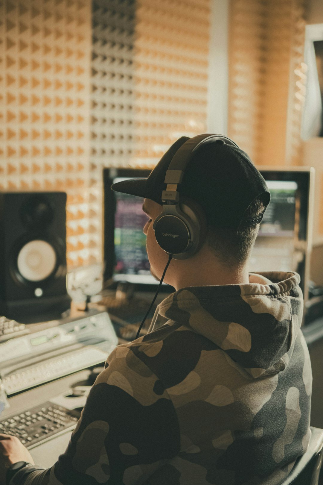 Finnish male sound engineer wearing headphones in a studio